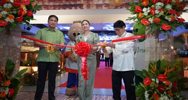 Dr. Dexter R. Buted (Administrator, Philippine Coconut Authority), DTI Secretary Maria Cristina Aldeguer-Roque, and Assistant Secretary Philip C. Young participate in the ribbon cutting ceremony of Cocolinarya Turismo 2025 at SM Megamall Trade Hall, Building B. The event, held during National Coconut Week, brought together key government and industry leaders to celebrate coconut sustainability and Filipino culinary heritage.