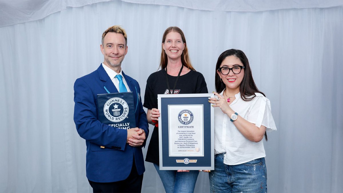 Watsons Philippines and Premiere Condoms successfully set a new Guinness World Records™ title for the Largest Donation of Condoms in One Hour at the Protected & Proud Concert. (L–R: Justin Patterson, Official Adjudicator, Guinness World Records; Denise van Dijk, President and CEO, DKT Health Inc.; Joweeh Liao, Director for Health Business Unit, Finance, Property, and Store Development, Watsons Philippines)