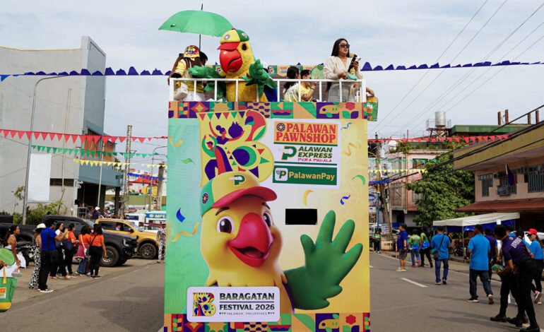 Pikoy, the official mascot of the Palawan Group of Companies, inspired by the endemic blue-naped parrot of Palawan, brought color and energy to the Baragatan Festival's float parade