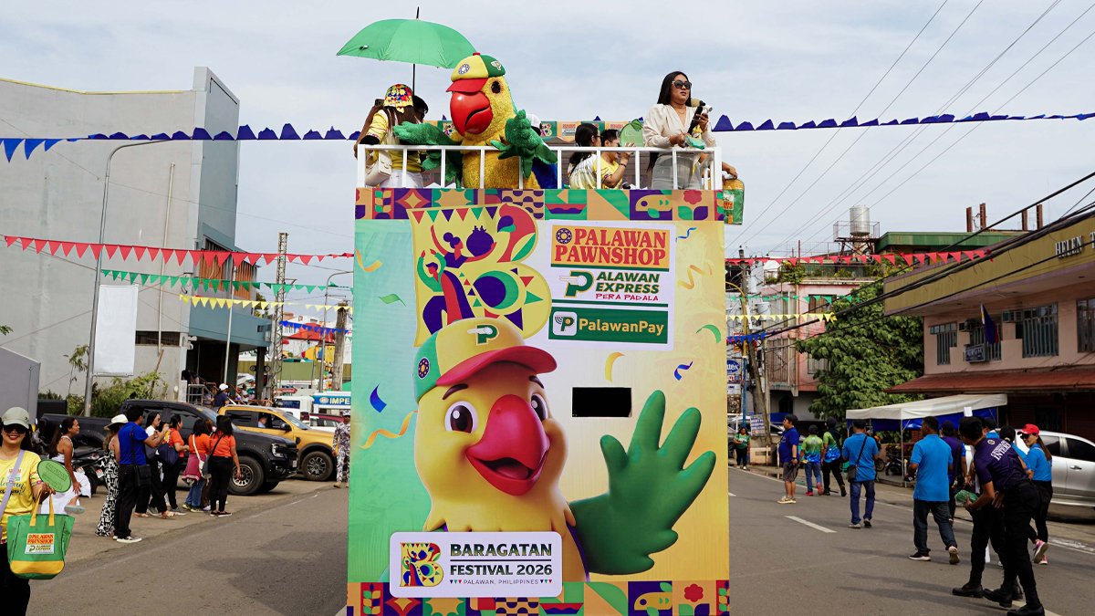 Pikoy, the official mascot of the Palawan Group of Companies, inspired by the endemic blue-naped parrot of Palawan, brought color and energy to the Baragatan Festival's float parade